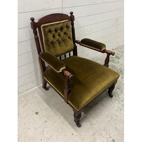 54 - A Victorian upholstered elbow chair