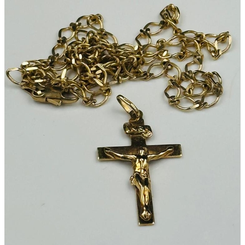 549 - A 9ct gold cross and chain, with and approximate weight of 8g