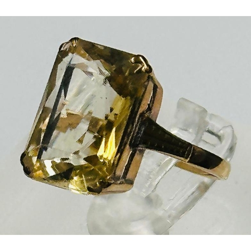 590 - A 9ct gold citrine ring (14mm x 10mm stone size approximately) size K and weight 3.4g.