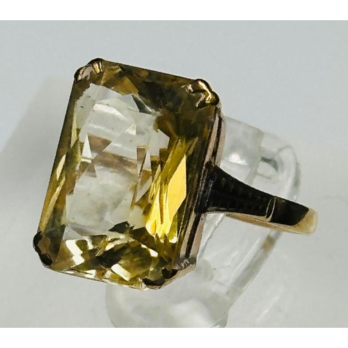 590 - A 9ct gold citrine ring (14mm x 10mm stone size approximately) size K and weight 3.4g.