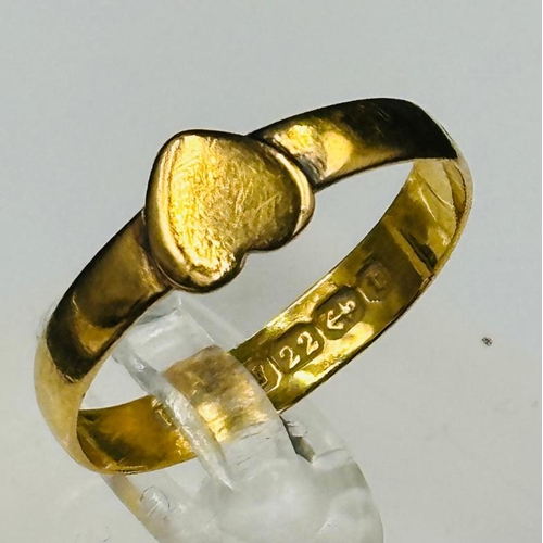 599 - A 22ct gold ring with heart motif approximate size P and weight 2.4g