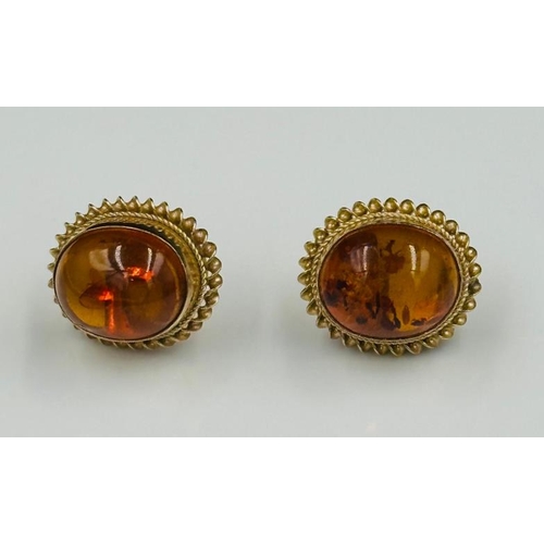 603 - A pair of Baltic Amber earrings on 9ct gold settings