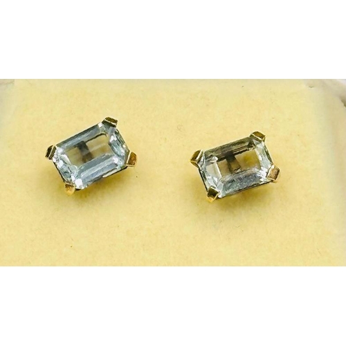 604 - A pair of 9ct gold aquamarine earrings