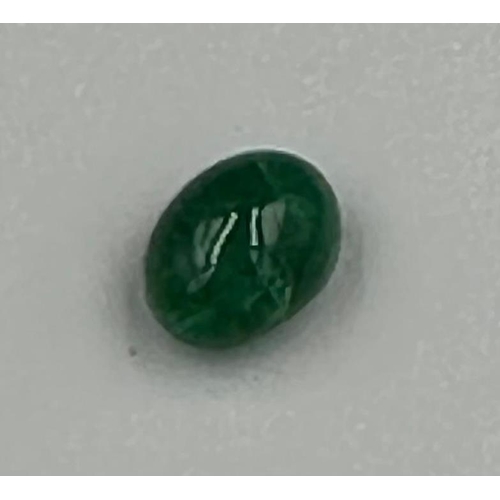 608 - An emerald cabochon stone 9mm