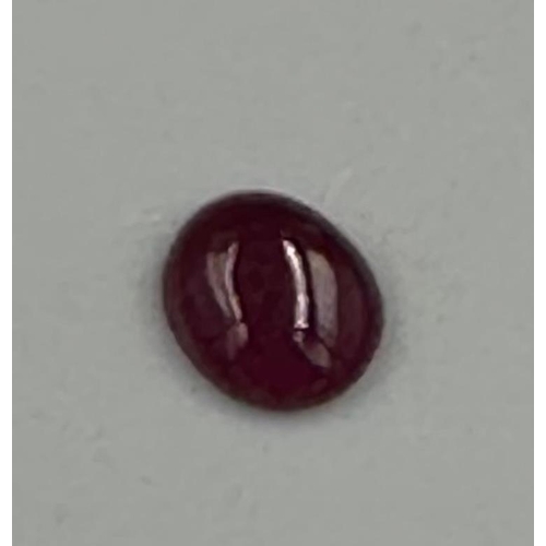 609 - A ruby cabochon stone 6mm