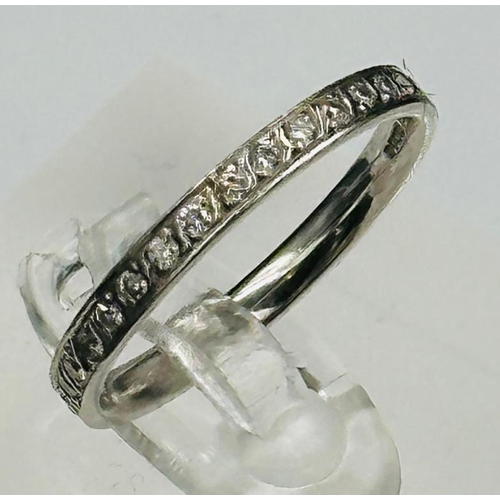 612 - A platinum diamond eternity ring, size N