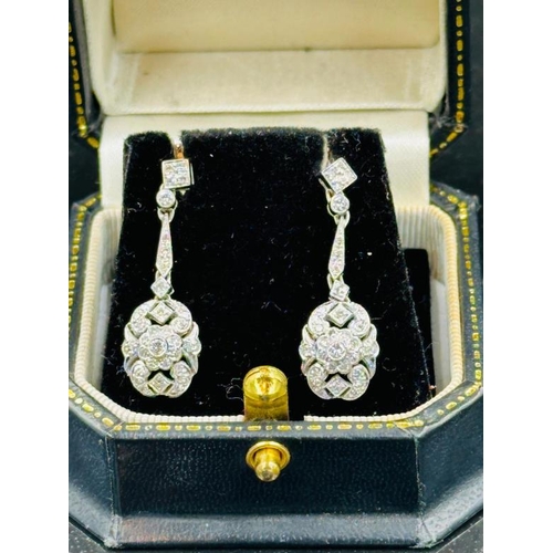 613 - 18ct white gold diamond drop earrings