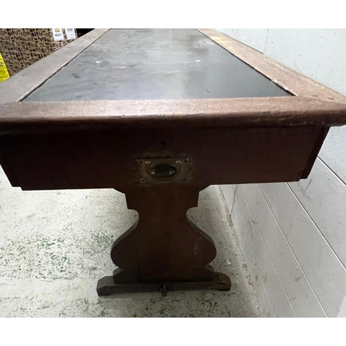 63 - An oak library table with leather top and drawer to one end (H77cm W160cm D66cm)