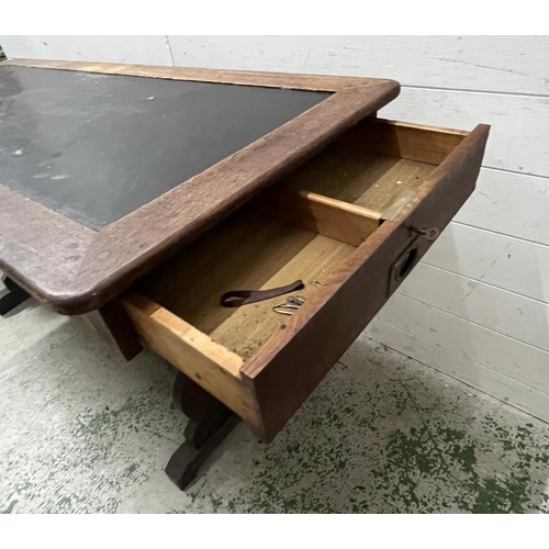 63 - An oak library table with leather top and drawer to one end (H77cm W160cm D66cm)