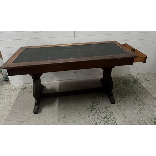 63 - An oak library table with leather top and drawer to one end (H77cm W160cm D66cm)