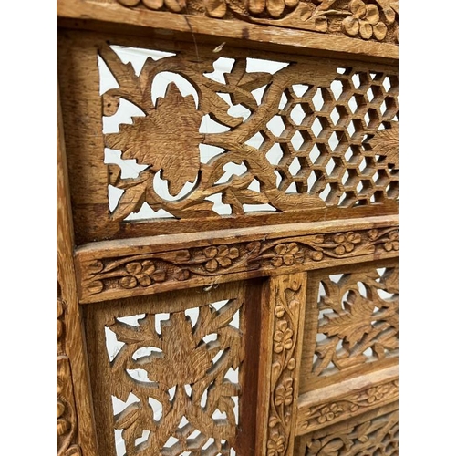 65 - Four panel folding teak screen with honey coombe pattern and carved leaves 50cm x 180cm