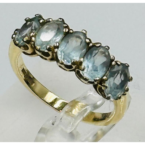 670 - A five stone blue topaz 9ct gold ring approximate size N and weight 2.9g