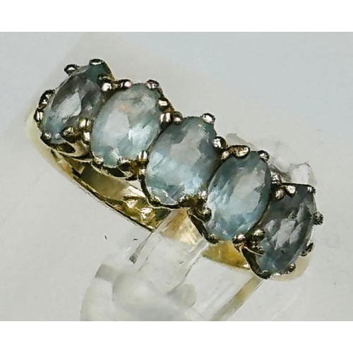 670 - A five stone blue topaz 9ct gold ring approximate size N and weight 2.9g