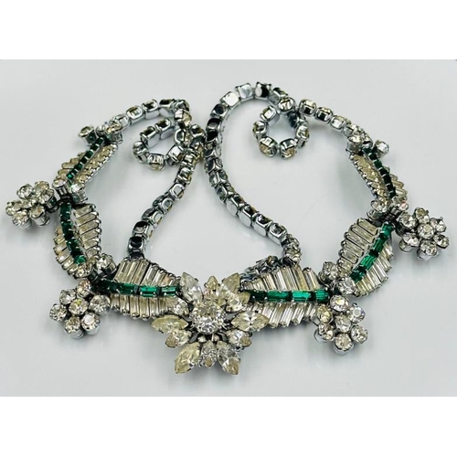 673 - An Art Deco style necklace with green and clear stones