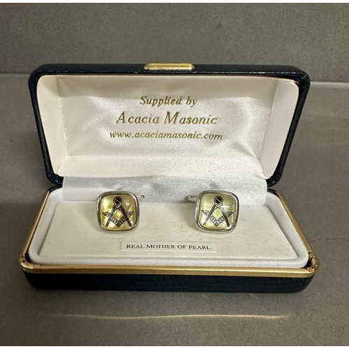 679 - A pair of mother of pearl Acacia masonic cufflinks