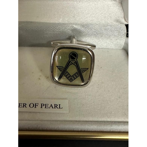 679 - A pair of mother of pearl Acacia masonic cufflinks