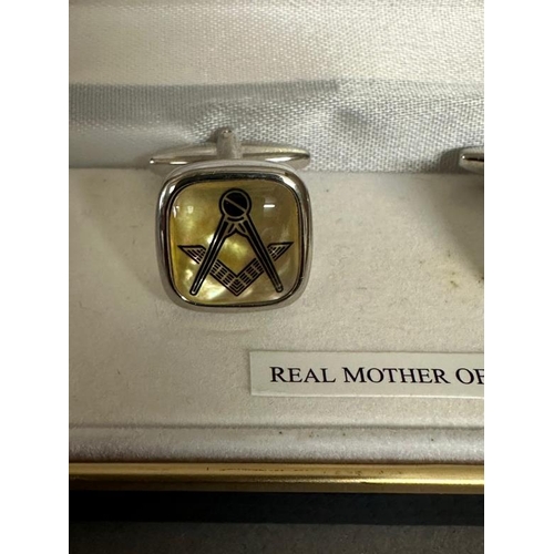 679 - A pair of mother of pearl Acacia masonic cufflinks