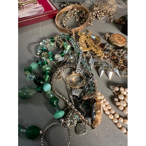 684 - A selection of costume jewellery and watches