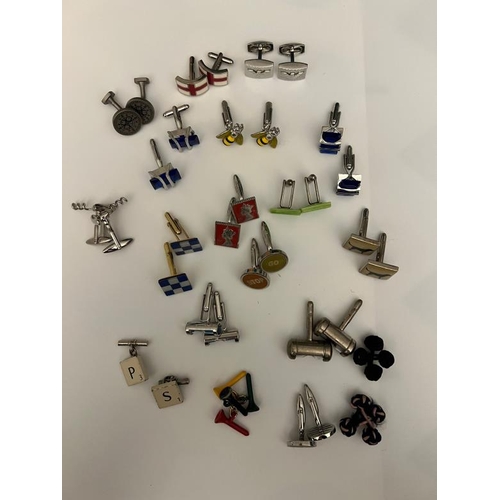 695 - A large collection of novelty cuff links various makers