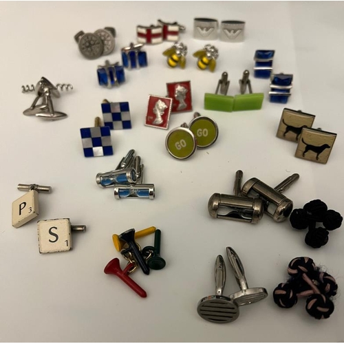 695 - A large collection of novelty cuff links various makers