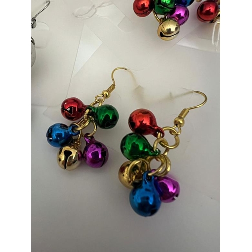 696 - A collection of costume jewellery earrings including Christmas themed baubles