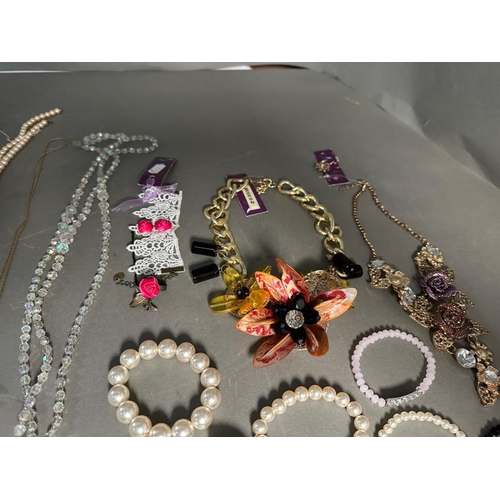 706 - A quantity of quality costume jewellery in various styles