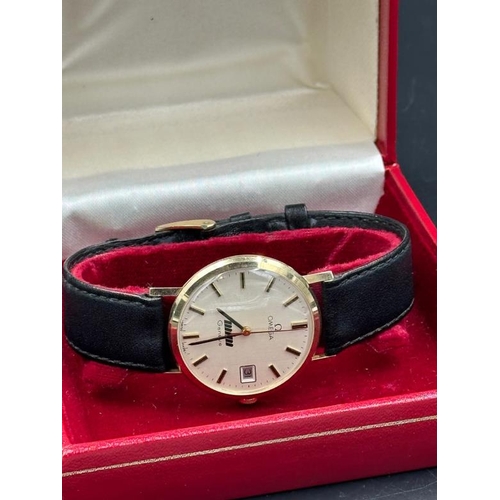 726 - A Vintage 1970's Gold Omega in original box with paperwork, engraved to back and on black leather st... 