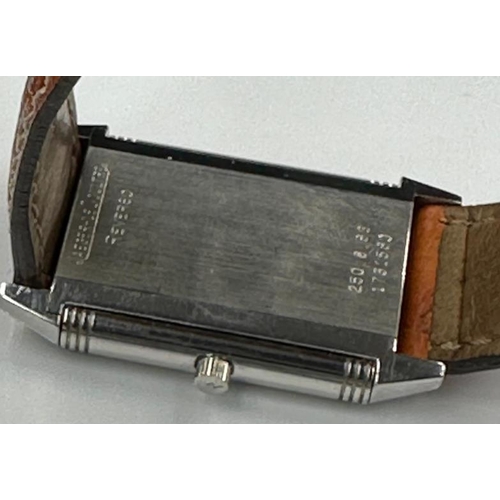 732 - A Jaeger Le Coultre Reverso on an ostrich strap No 250886, with original papers.