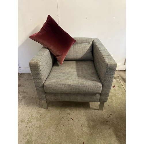 74 - A pair of grey and blue flecked arm chairs on chrome legs