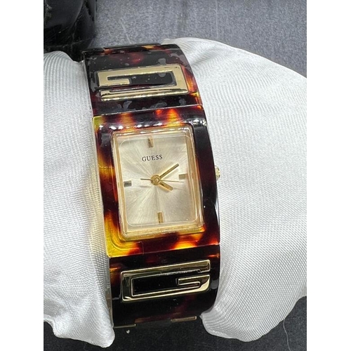 768 - A Guess Ladies Fashion watch in original bag.