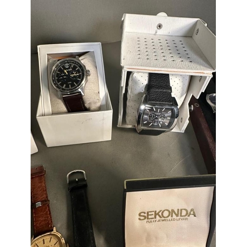 773 - A selection of gentleman's fashion wristwatches to include Timberland, Timex and Sekonda