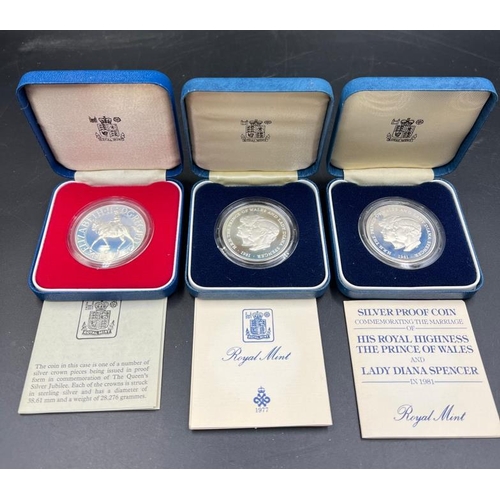 787 - A selection of three silver proof coins: 1977 Silver Jubilee, and two commemorating the marriage of ... 