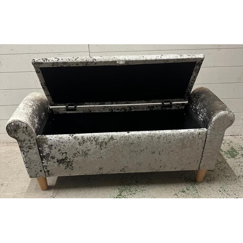 80 - A silver crushed velvet window seat with hinged seat opening to storage (H52cm W120cm D37cm)