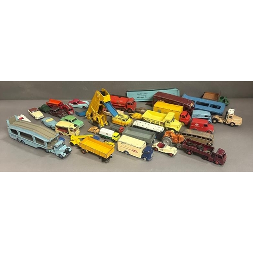 828 - A quantity of vintage Dinky Diecast model vehicles (some playworn)