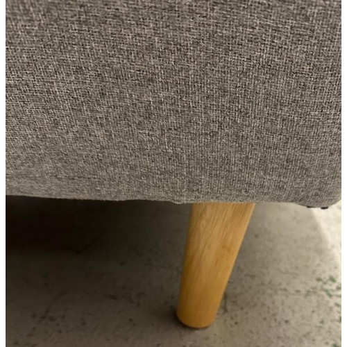 85 - A grey upholstered contemporary button back arm chair