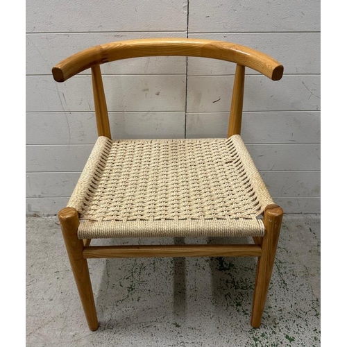 86 - Two contemporary light wood dining chairs with cream rattan seats