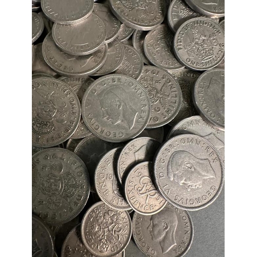 129 - A quantity of UK silver content coinage to include shillings, two shilling and six pence