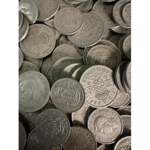 129 - A quantity of UK silver content coinage to include shillings, two shilling and six pence