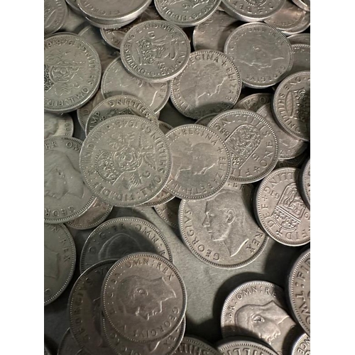 129 - A quantity of UK silver content coinage to include shillings, two shilling and six pence