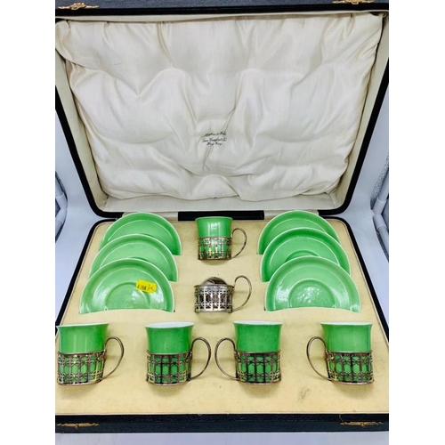 13 - A cased part Shelley tea set with silver cup holders for Mappin and Webb AF