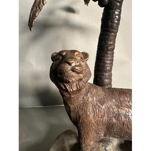 159 - A cold cast bronze of a Bengal tiger under a palm tree