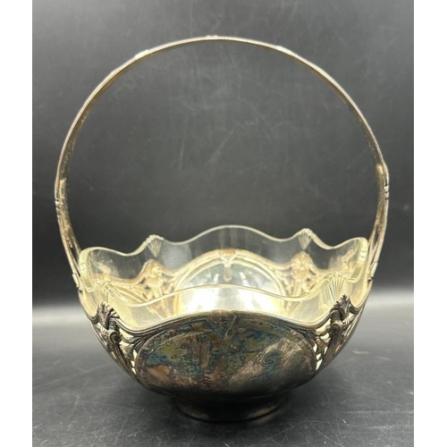 16 - A silver plated Art Nouveau bowl with clear glass insert in the style of WMF