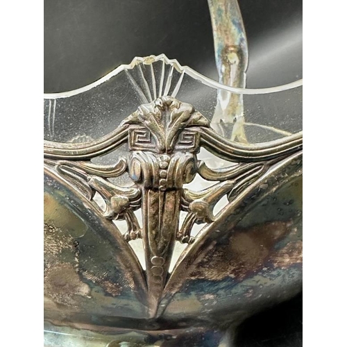 16 - A silver plated Art Nouveau bowl with clear glass insert in the style of WMF