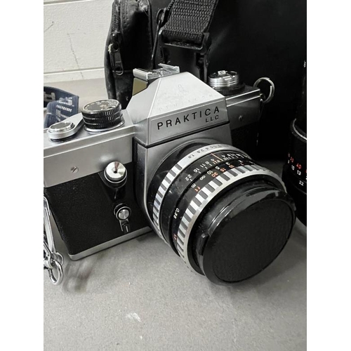 204 - Two Praktica cameras and lens