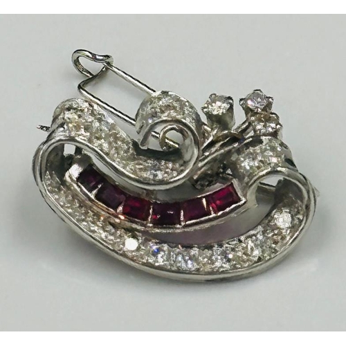 65 - A  vintage diamond and ruby brooch, approximate weight 6.6g