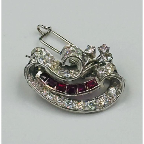 65 - A  vintage diamond and ruby brooch, approximate weight 6.6g