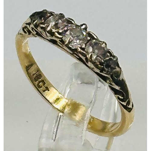 67 - An 18ct gold five stone diamond ring approximate weight 2.6g and size L