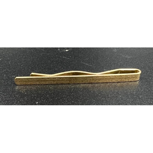 69 - A 9ct gold front and back tie pin, approximate total weight 6.9g