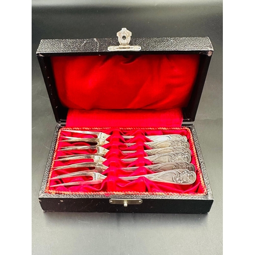 20 - A boxed set of six Art Nouveau WMF pickle forks