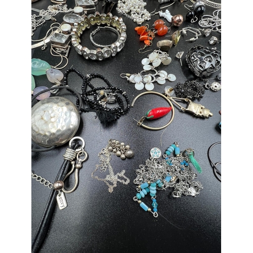 151 - A selection of costume jewellery to include necklaces, bracelets, earrings etc.